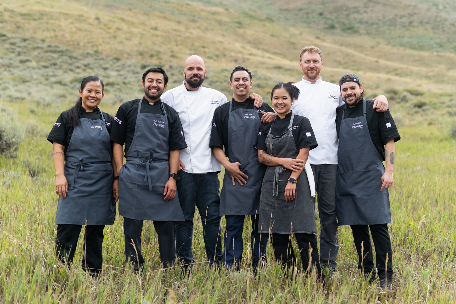 The Provisions chef team standing in a sagebrush meadow in Jackson Hole