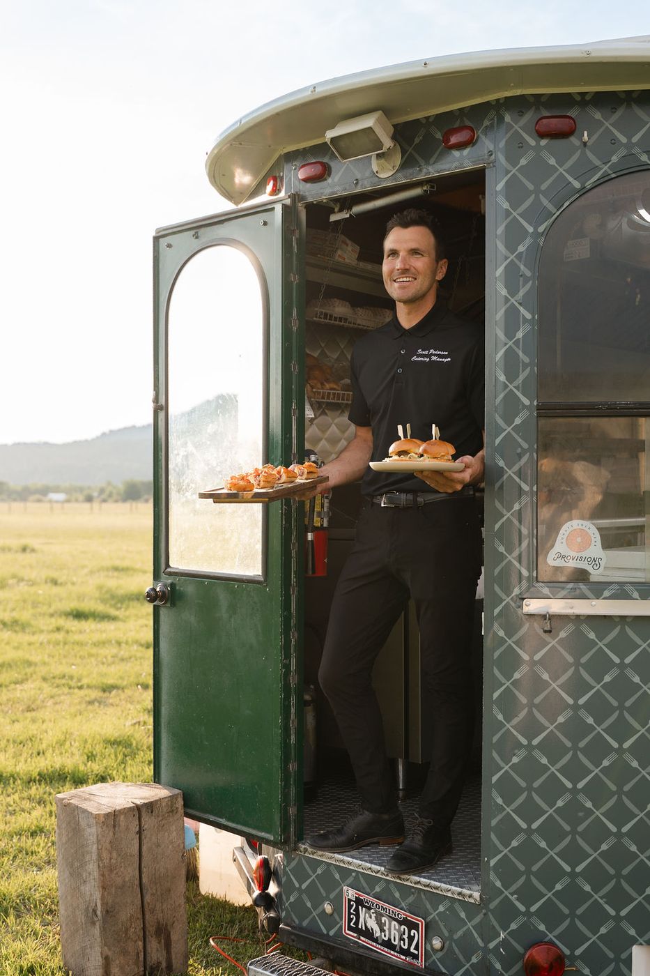 Chef standing in the food truck doorway