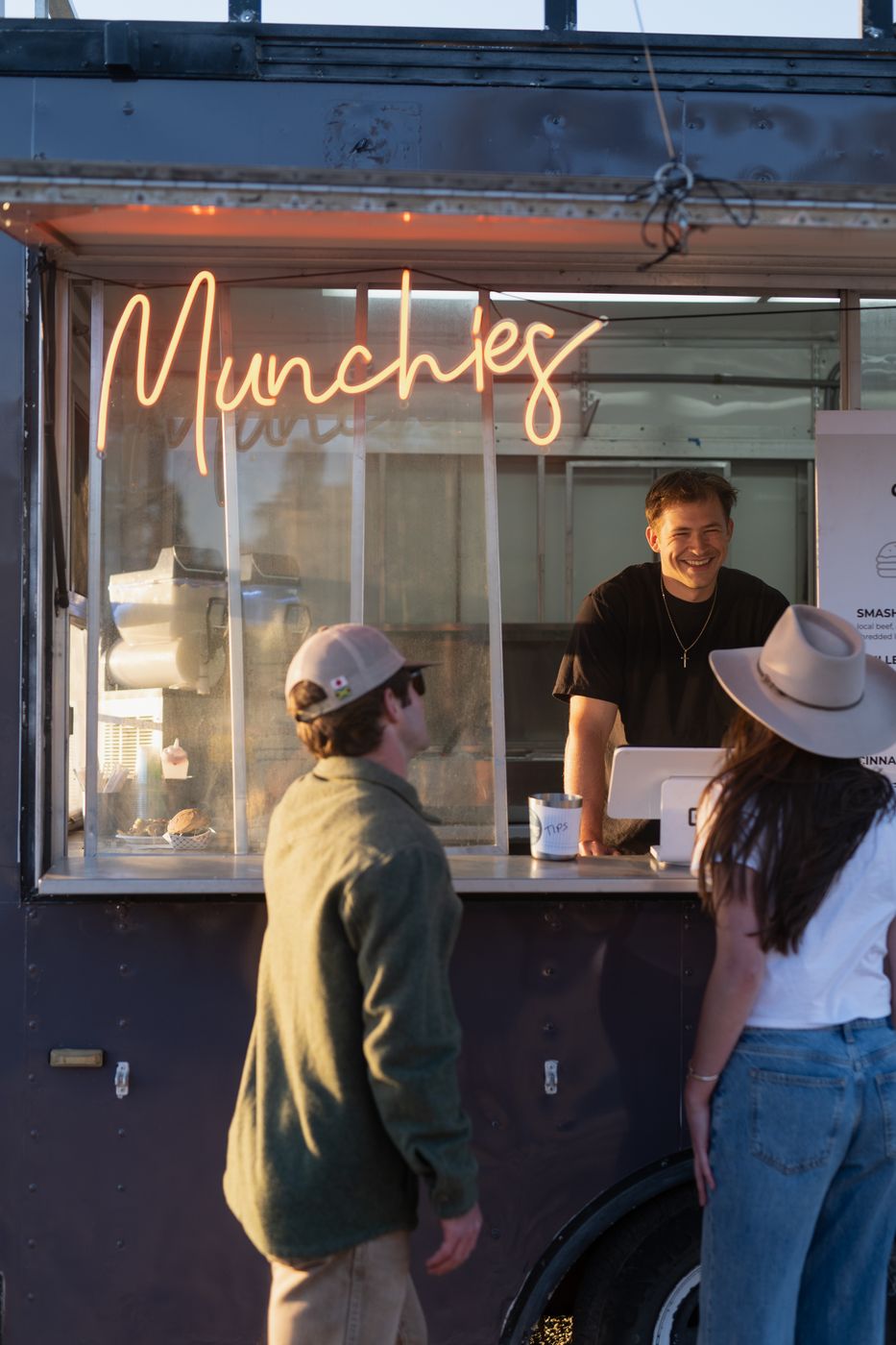Guests ordering at the food truck window