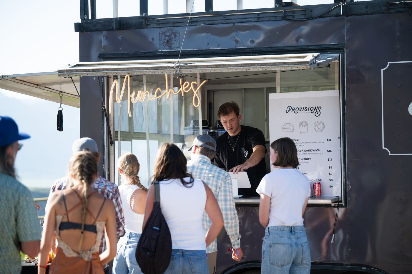 Guests lined up at the Provisions food truck at a concert
