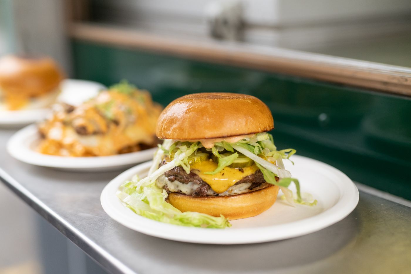 Smash burger and fries on the counter