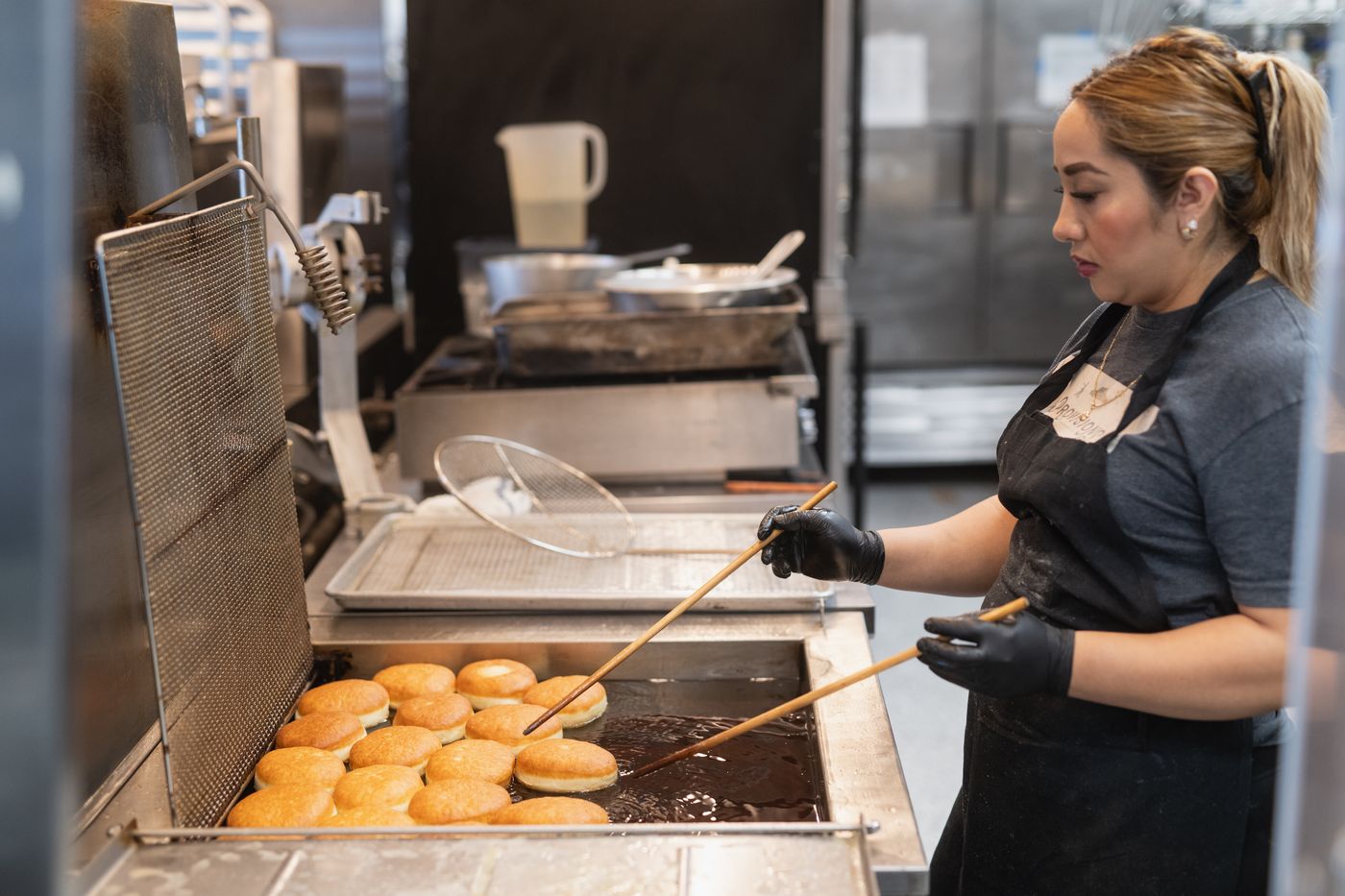 Provisions baker frying donuts