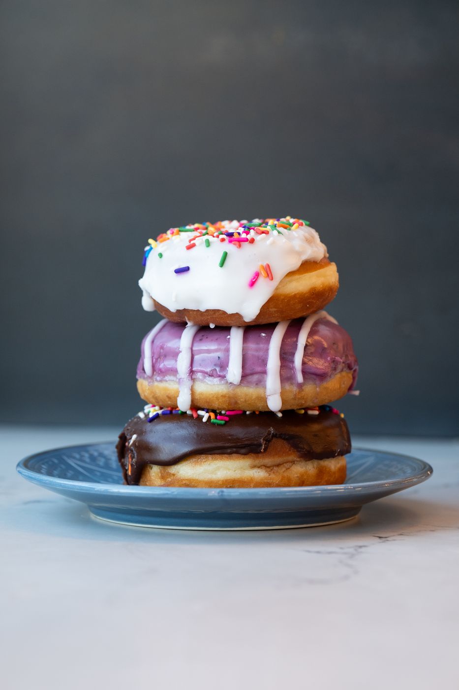 Stack of three glazed donuts