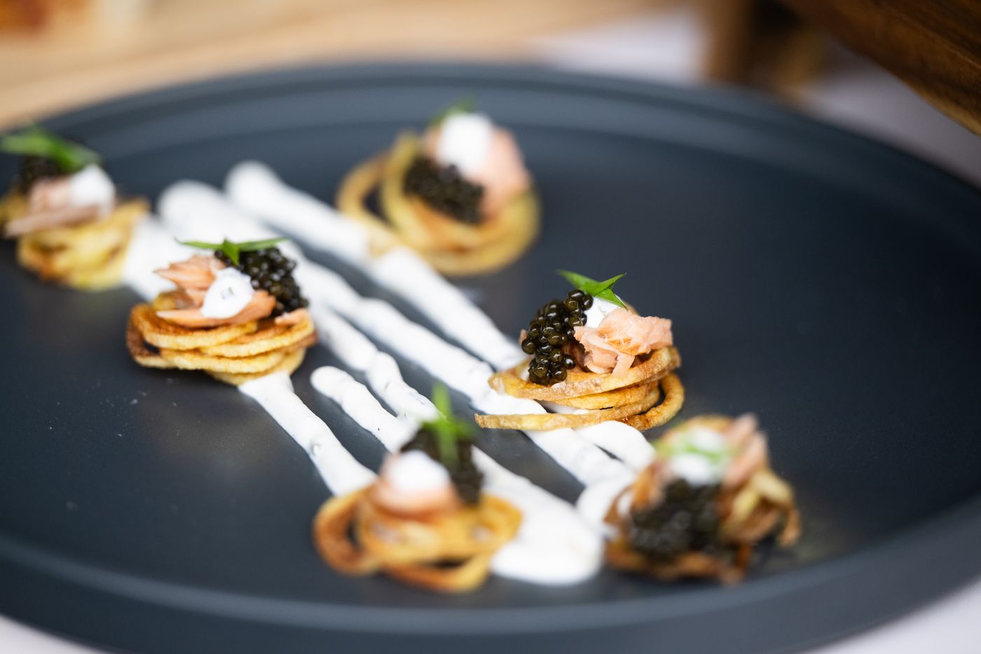 Blini with crème fraîche and caviar