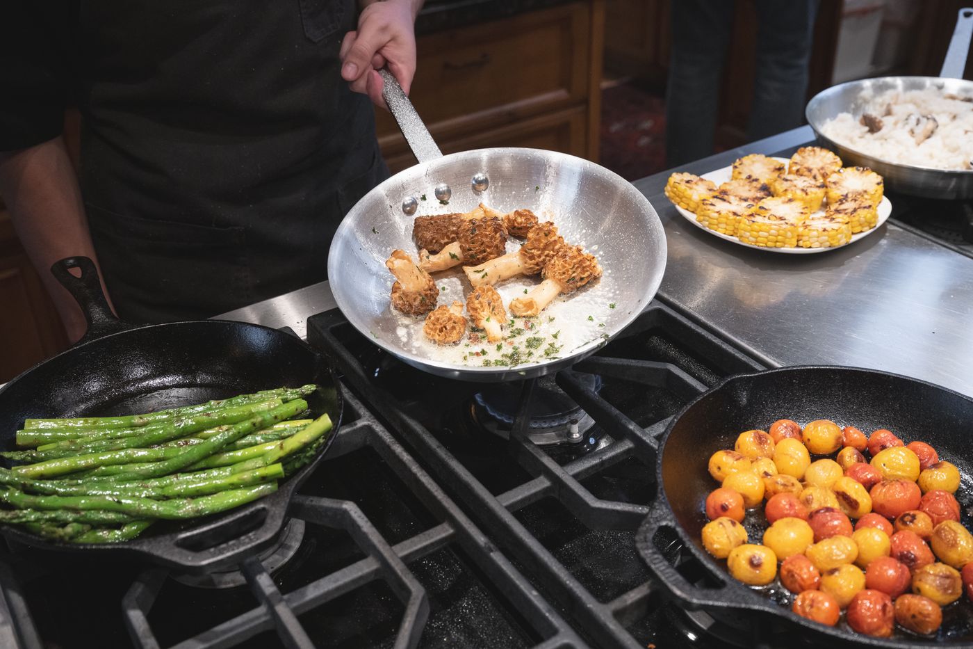 Chef cooking on the stove in a private kitchen