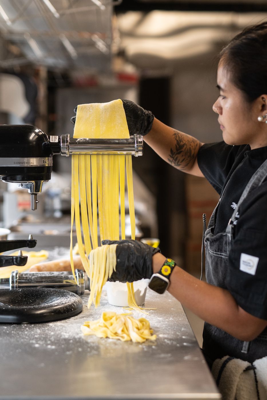 Chef rolling fresh pasta