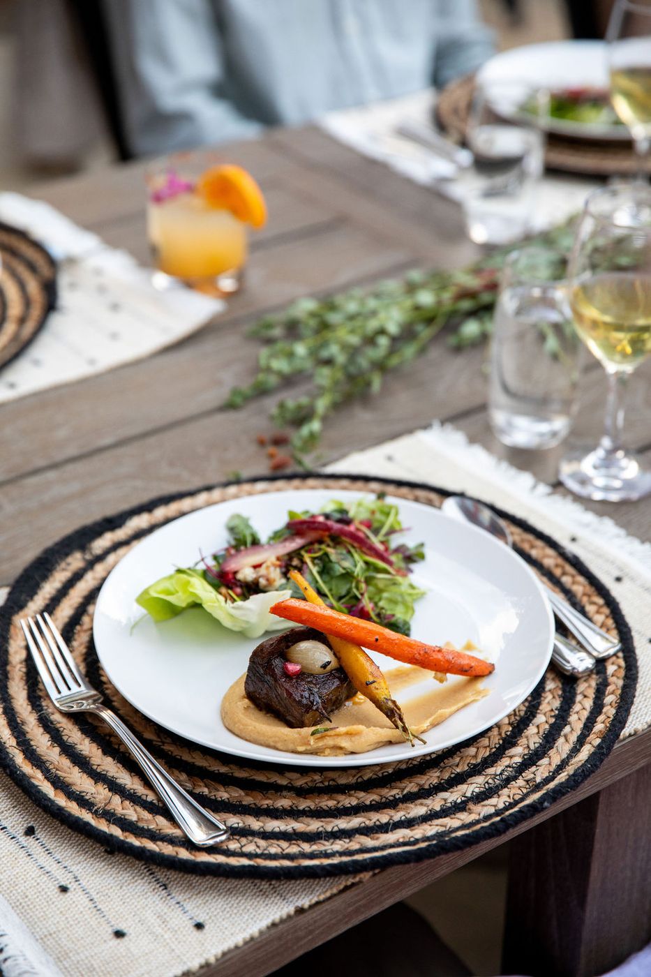 Plated dinner at a rustic place setting