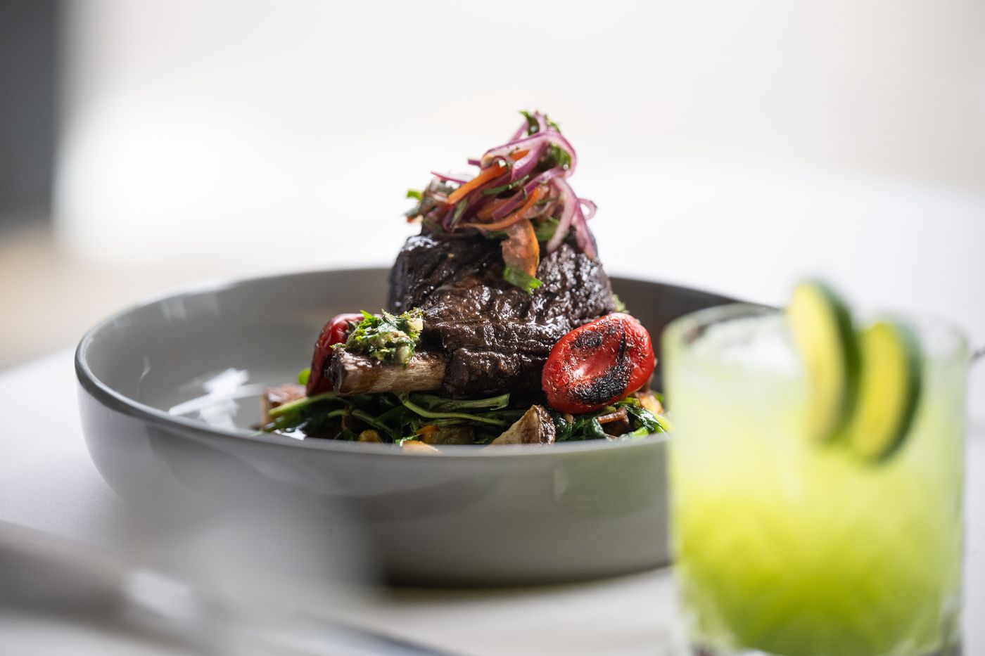 Braised short rib with a cucumber lime cocktail